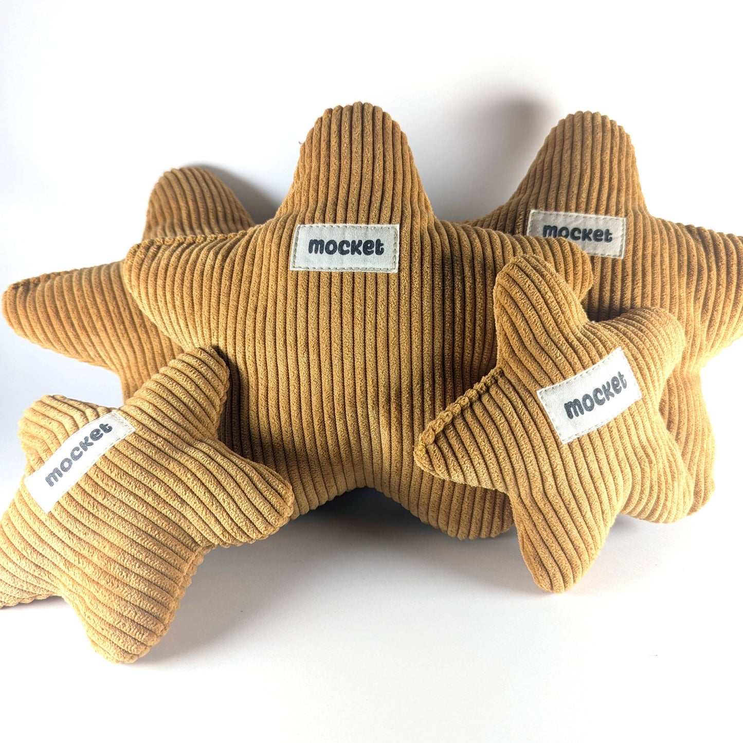 groupe de jouets en forme d'étoile de grande et petite taille